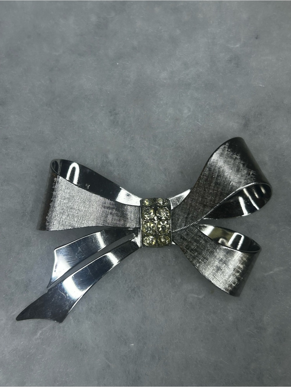 Crystal-Accent Vintage Coro Silver Tone Bow Brooch (c. 1958–1963)